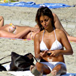 Fourth pic of Monica Cruz in white bikini on the beach