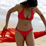 First pic of Padma Lakshmi in red bikini on a beach
