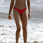 Third pic of Padma Lakshmi in red bikini on a beach