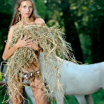 Fourth pic of Alena I - Alena I takes her sexy blue lace dress and poses nude with a horse by the river.