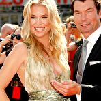 Second pic of Rebecca Romijn shows cleavage at Emmy Awards