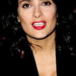 Fourth pic of Salma Hayek slight cleavage in red dress at Yves Saint Laurent fashion show