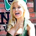 Fourth pic of Busty Holly Madison legs and cleavage at St. Patrick day celebration