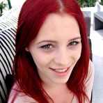 Second pic of Gabrielle Lupin - Hot redhead model Gabrielle Lupin strips outdoors and shows her big breasts.