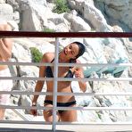 Second pic of Michelle Rodriguez in black bikini poolside shots