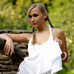 First pic of Lizzy Merova - Lizzy Merova takes her sexy white dress outdoors and shows us her beautiful rack.