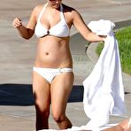Third pic of Myleene Klass sunbathing in white bikini and braless