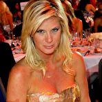 Second pic of Rachel Hunter posing for paparazzi, shows her legs in Monte Carlo