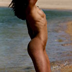 Fourth pic of Sasha C - Sasha C takes her slutty white dress on the beach and shows her amazing ass.