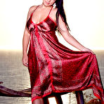 First pic of Aria Giovanni - Frisky Aria Giovanni walks along the sea and even shows off her naked body.