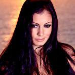 Third pic of Aria Giovanni - Frisky Aria Giovanni walks along the sea and even shows off her naked body.