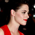 First pic of Kristen Stewart posing in red dress at Cosmopolis Premiere