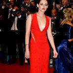 Second pic of Kristen Stewart posing in red dress at Cosmopolis Premiere