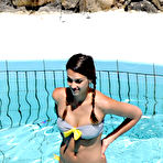 First pic of Jessica Alba swimming in the pool in gray bikini