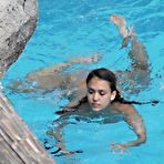 Third pic of Jessica Alba swimming in the pool in gray bikini
