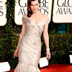 First pic of Milla Jovovich posing at Golden Globe Awards 2011 in long night dress