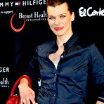 Second pic of Milla Jovovich promotes new Tommy Hilfiger bag