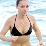 First pic of Christina Ricci shows tight ass and nice cleavage in black bikini