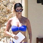Second pic of Kourtney Kardashian wearing a bikini at a pool in Mexico