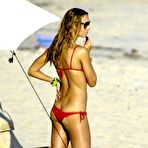First pic of Aleksandra Nikolic Melnichenko caught in sexy red bikini on the beach in St. Barts