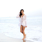 First pic of Alessandra Ambrosio white clothed on the beach photoshoot