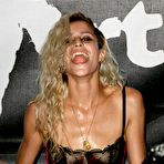 First pic of Alice Dellal caught topless on the beach
