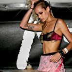 Fourth pic of Alice Dellal caught topless on the beach