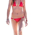 Third pic of Anne Vyalitsyna side of boob in red bikini