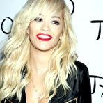 Third pic of Rita Ora cleavage in tight leather costume
