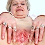 Second pic of Older nurse Ruzena gaping her untidy vulva wide
