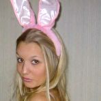 Fourth pic of Big titted slutty blonde posing in see through bunny out fit