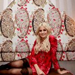 Second pic of Pixie Lott in stockings and red dress photoshoot