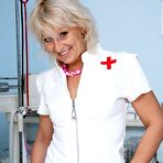 First pic of Pervy midle aged nurse Romana masturbates her pussy with pussy spreader on gyno chair