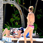 First pic of Kate Moss topless on a beach in Jamaica