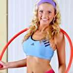 First pic of Frisky blondie bares boobies before hula hoop and skipping rope training in her patterned pink pantyhose