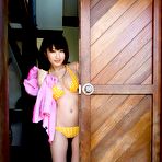Third pic of Busty Asian Arisa Misato yellow bikini posing