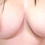 Third pic of Big-tittied Asian with puffy nipples loves riding white cock