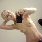 Second pic of Very enthusiastic blonde girl does some nude selfies.