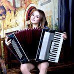 First pic of Naked Teen Playing The Accordion