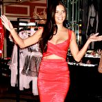 Third pic of Adriana Lima in red dress at VS Store Event