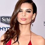 Second pic of Emily Ratajkowski posing in red, shows cleavage