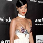 Fourth pic of Rihanna covers up her nipples at amfAR