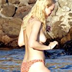 Second pic of Dakota Johnson caught topless in Pantelleria