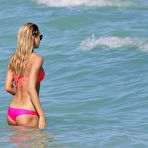 First pic of Lauren Stoner in pink bikini on a beach