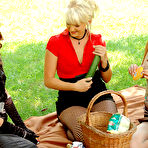 First pic of Kitty Saliery and two more clothed ladies have lesbian sex and pissing fun on picnic