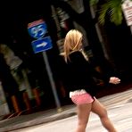 Fourth pic of It's a rainy day in Miami, but like the mail man, our creepy camera guy is out looking for another hot babe in pantyhose. @ PantyhoseAddict