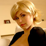 Third pic of ErrotiQ.com's gallery :: curvy iga reveals her large breasts as she slowly undresses after a long day of work.