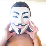 First pic of Masked brunette babe Alina Henessy spreads her asshole after throwing her panties off.