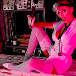 First pic of Kinky MILF nurse in white stockings over pantyhose @ PantyhoseAddict