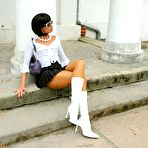 Second pic of Public escapades of a brune slut in pantyhose and glam boots